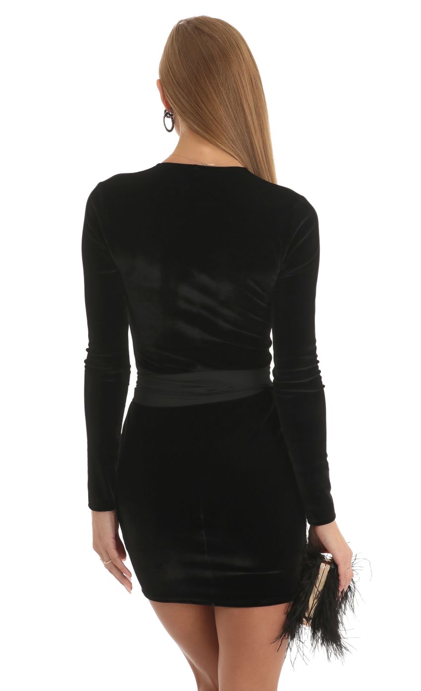 Picture Velvet V-Neck Dress in Black. Source: https://media-img.lucyinthesky.com/data/Jan23/850xAUTO/f4a5bda5-1761-4a73-93c5-737ce1b7f8de.jpg