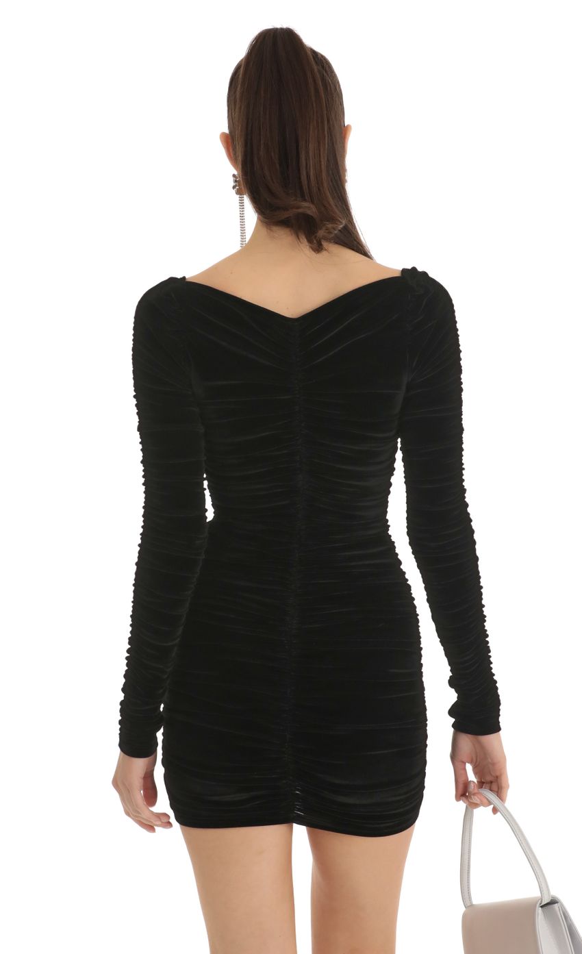 Picture Ruched Velvet Bodycon Dress in Black. Source: https://media-img.lucyinthesky.com/data/Jan23/850xAUTO/ff0dafac-e678-4906-9737-0661f6e26f70.jpg