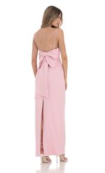 Picture Back Bow Maxi Dress in Pink. Source: https://media-img.lucyinthesky.com/data/Jan24/150xAUTO/09554147-dfd9-4304-98ba-5ba337899a1f.jpg