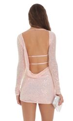 Picture Sequin High Neck Open Back Dress in Pink. Source: https://media-img.lucyinthesky.com/data/Jan24/150xAUTO/660288dc-493f-4fa8-a621-4533f98d74e8.jpg