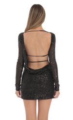 Picture Sequin High Neck Open Back Dress in Black. Source: https://media-img.lucyinthesky.com/data/Jan24/150xAUTO/8432ebfc-6bb6-4b94-9586-81c0eca7034a.jpg