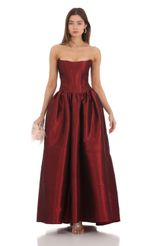 Picture Strapless Corset Gown in Deep Red. Source: https://media-img.lucyinthesky.com/data/Jan24/150xAUTO/d771bcf0-ec8e-4444-906c-1104e3983d94.jpg