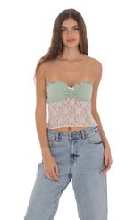 Picture Strapless Lace Top in Sage. Source: https://media-img.lucyinthesky.com/data/Jan24/150xAUTO/da50a2b3-9ea1-4118-b889-a349e4009ab3.jpg