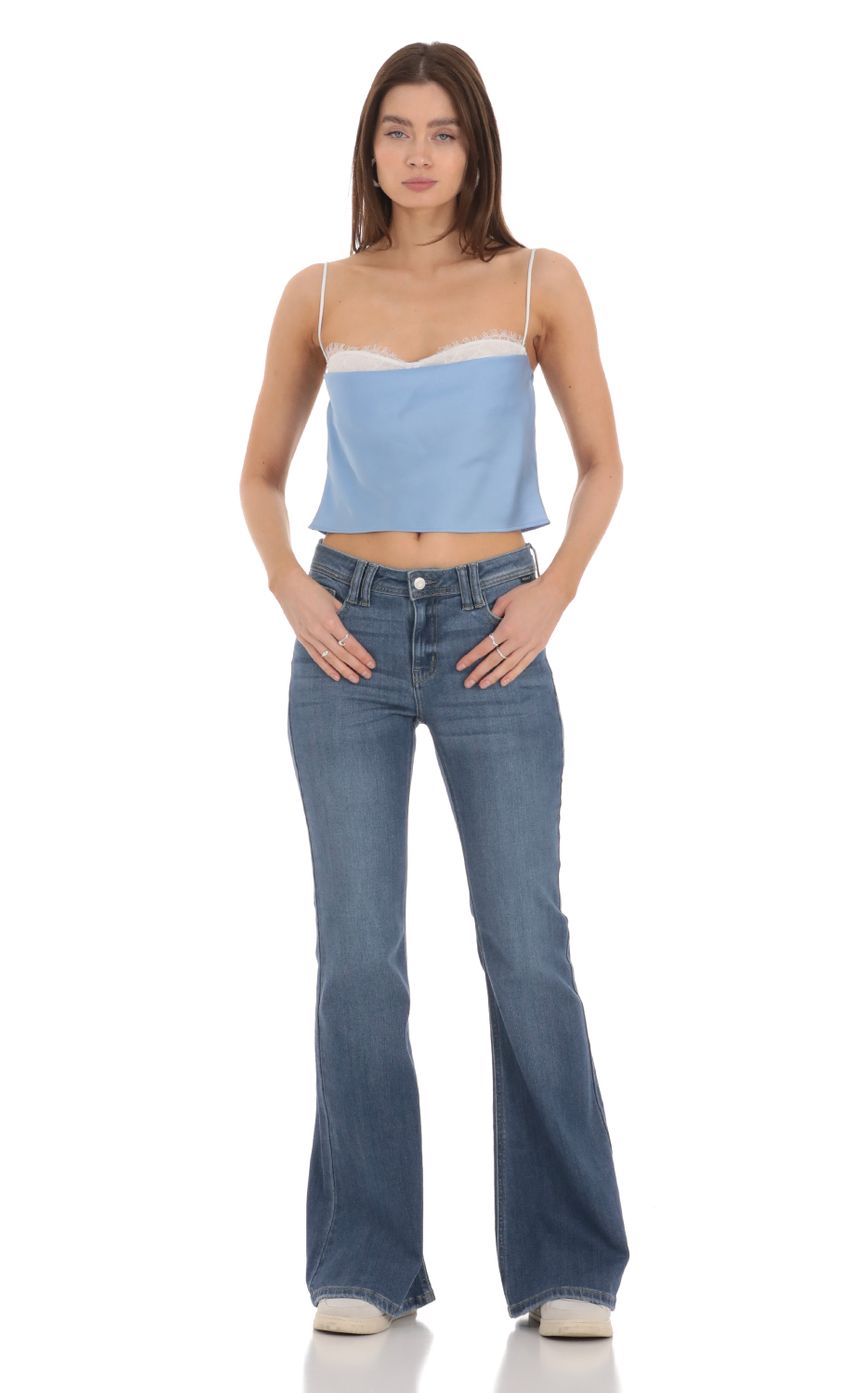 Picture Mesh Satin Top in Blue. Source: https://media-img.lucyinthesky.com/data/Jan24/850xAUTO/00e9f20d-a27d-4bd4-813f-d11e652f8ae6.jpg
