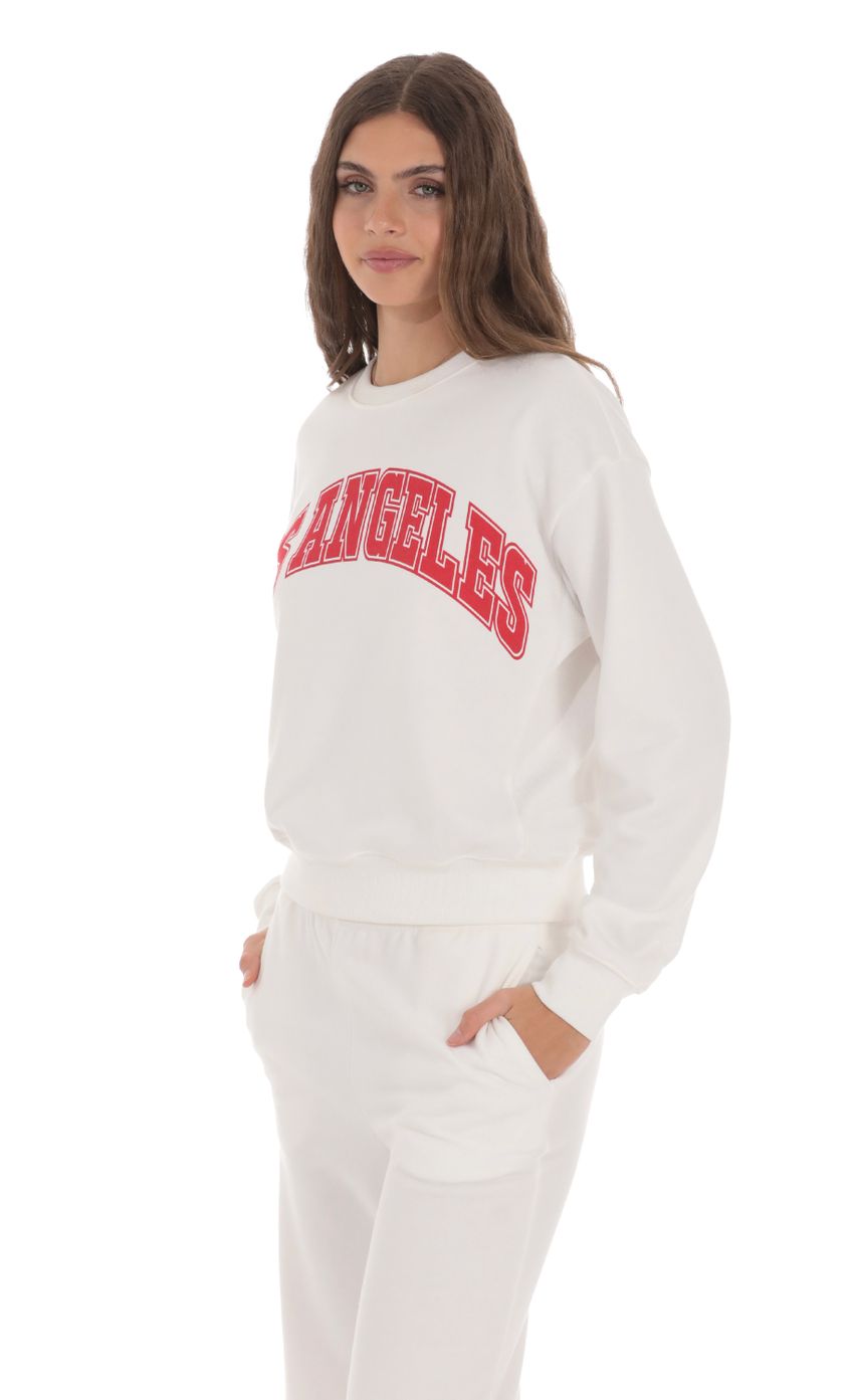 Picture Los Angeles Jumper in White. Source: https://media-img.lucyinthesky.com/data/Jan24/850xAUTO/0715b688-4ddb-4c82-9dd2-c0bcacf67fe4.jpg