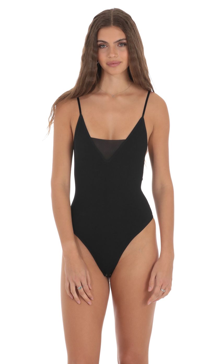 Picture Ribbed Thong Bodysuit in Black. Source: https://media-img.lucyinthesky.com/data/Jan24/850xAUTO/14c68770-fcaa-490b-91d5-0ca38d97aec1.jpg