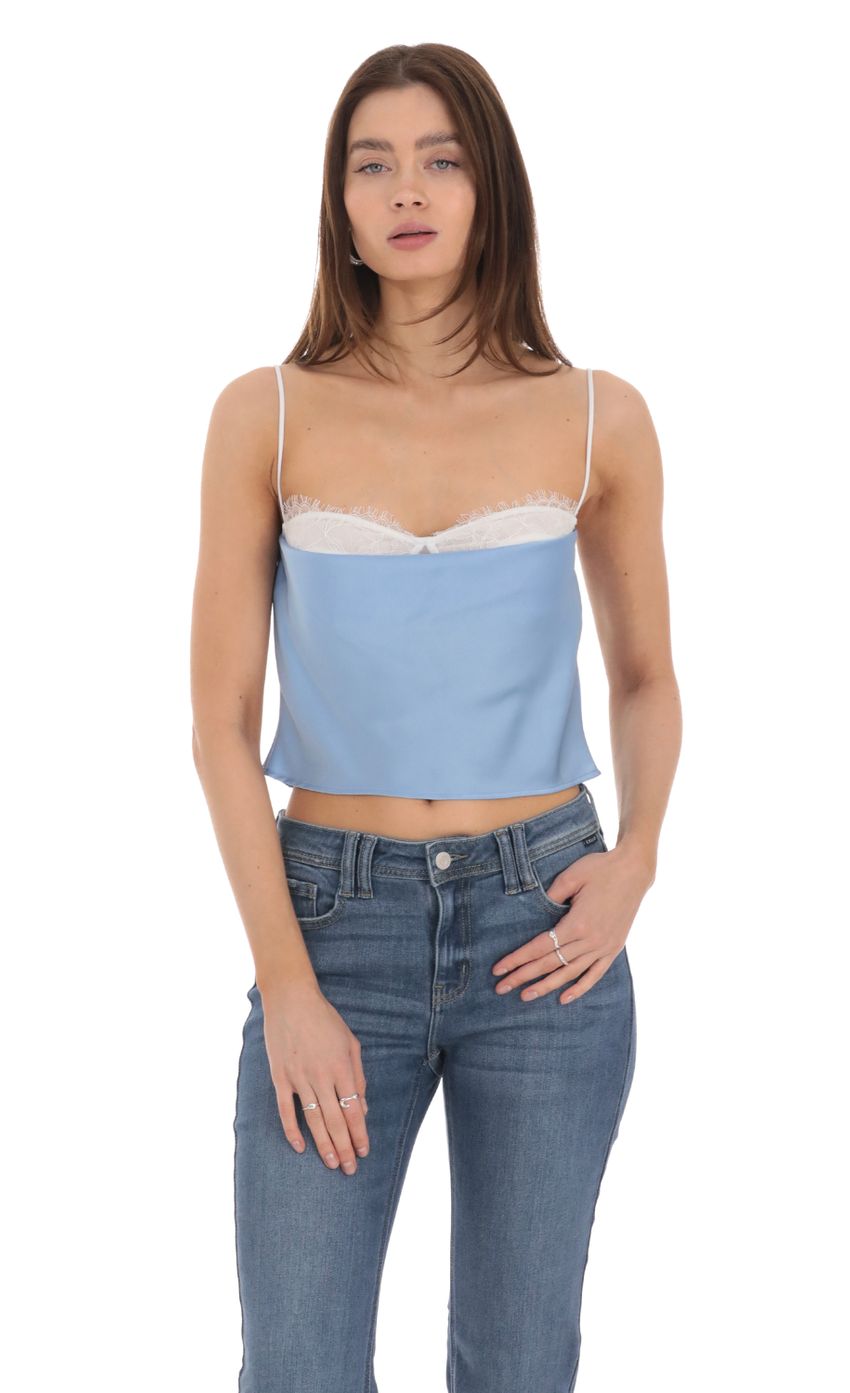 Picture Mesh Satin Top in Blue. Source: https://media-img.lucyinthesky.com/data/Jan24/850xAUTO/269646ce-5d28-413b-8c69-dc0843ca9d2c.jpg