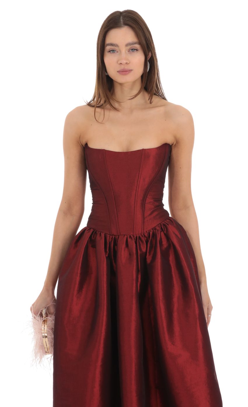 Picture Strapless Corset Gown in Deep Red. Source: https://media-img.lucyinthesky.com/data/Jan24/850xAUTO/277fc130-3dfc-47aa-9fde-c6d214928d3f.jpg