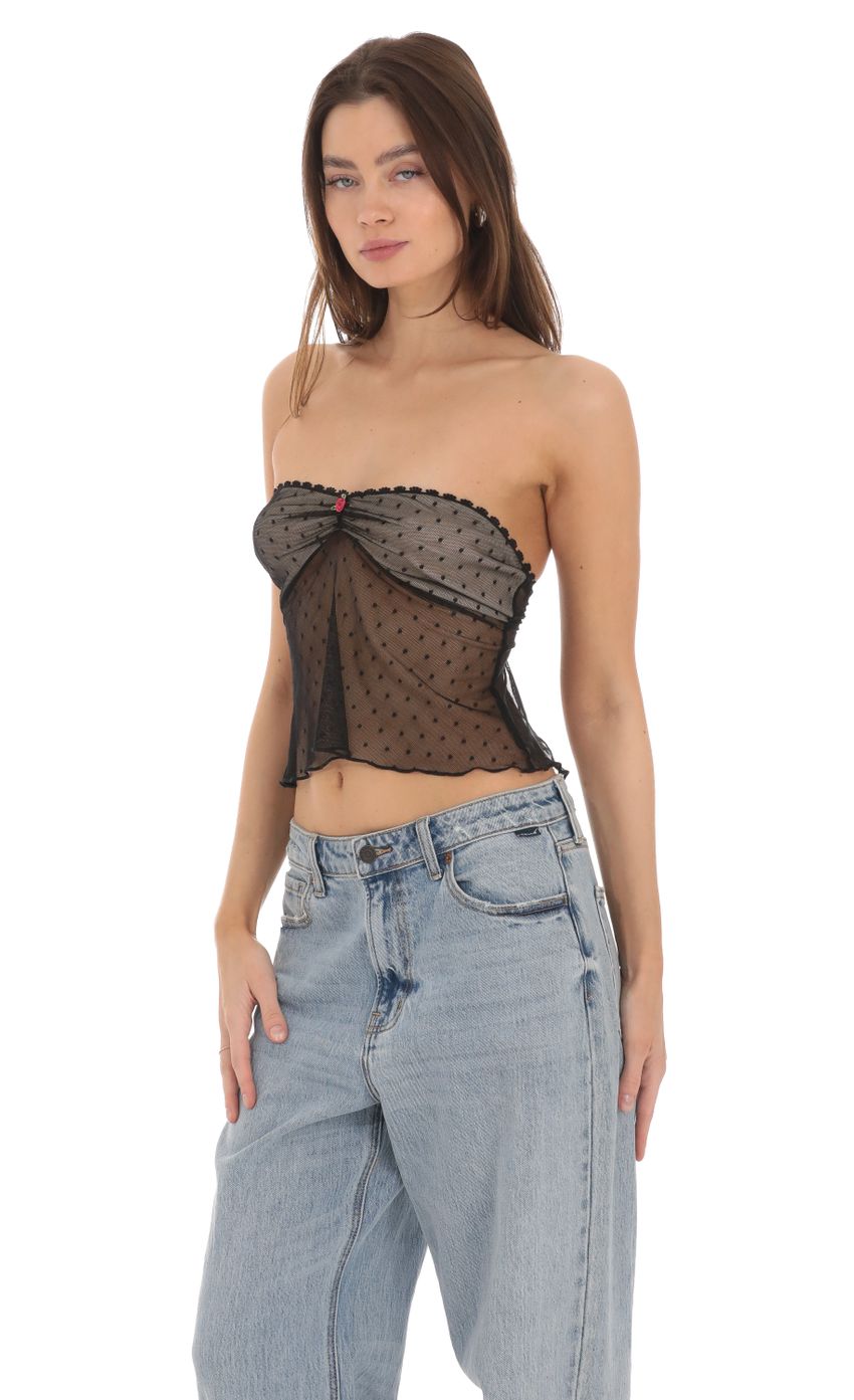 Picture Dotted Strapless Babydoll Top in Black. Source: https://media-img.lucyinthesky.com/data/Jan24/850xAUTO/2a0fe72f-232b-4937-a58f-1353d22ffc46.jpg