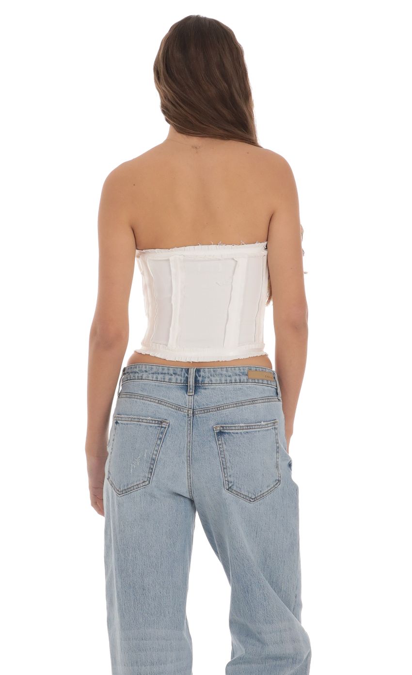 Picture Strapless Hook Corset Top in White. Source: https://media-img.lucyinthesky.com/data/Jan24/850xAUTO/2d834e57-5a06-4f51-aed3-f2938c0f8529.jpg