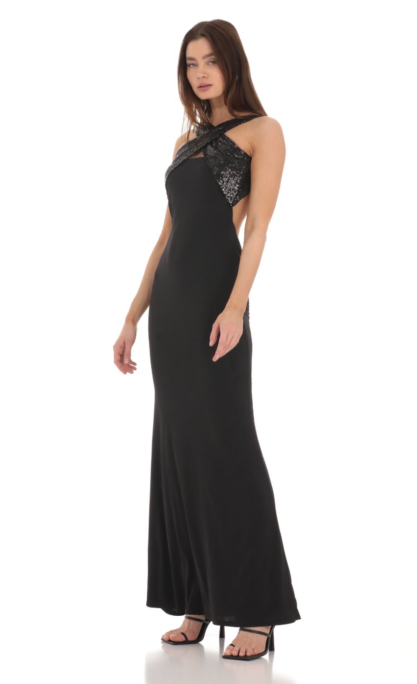 Picture Sequin Cross Neck Maxi Dress in Black. Source: https://media-img.lucyinthesky.com/data/Jan24/850xAUTO/33ef937f-f5aa-4a0d-8577-46aceca26fce.jpg