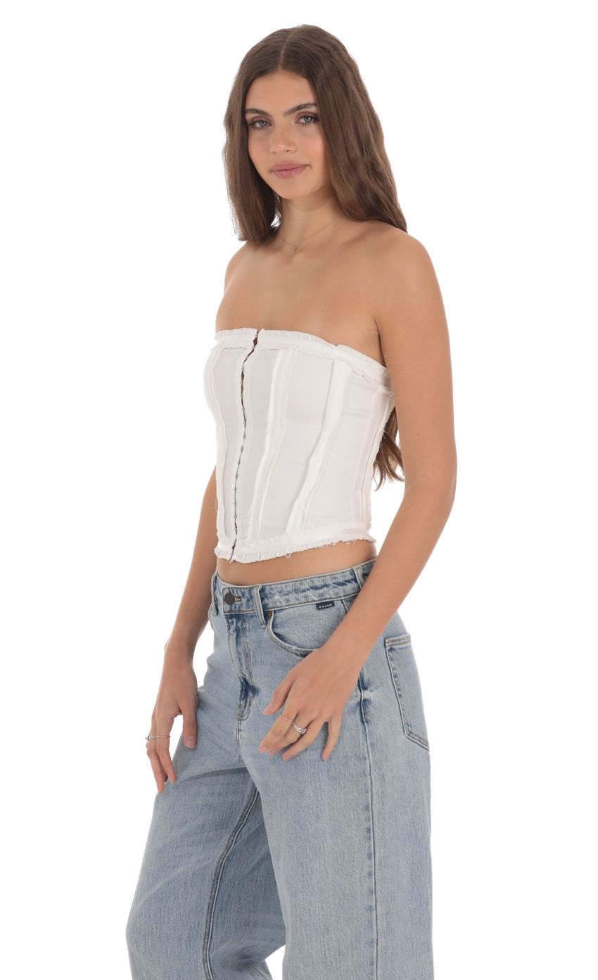 Picture Strapless Hook Corset Top in White. Source: https://media-img.lucyinthesky.com/data/Jan24/850xAUTO/379ac86c-0a40-4117-b0aa-218f9e421b73.jpg