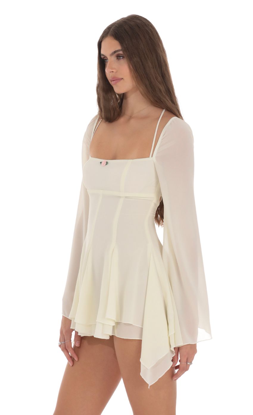 Picture Chiffon Flare Sleeve A-line Dress in Cream. Source: https://media-img.lucyinthesky.com/data/Jan24/850xAUTO/3fca4fa7-0375-4995-a1ac-fdc7571ac8b1.jpg
