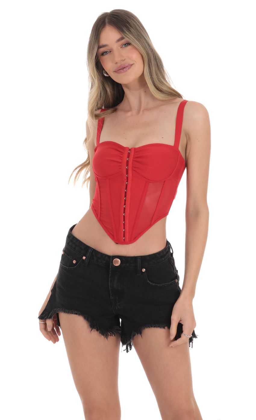 Picture Mesh Corset Top in Red. Source: https://media-img.lucyinthesky.com/data/Jan24/850xAUTO/47cd61df-9c6c-4d6e-80d2-e007abbd954b.jpg