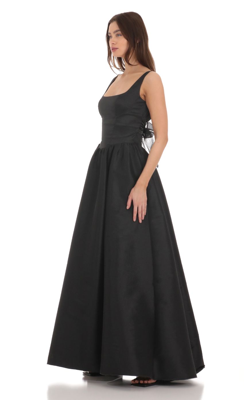 Picture Back Bow Gown in Black. Source: https://media-img.lucyinthesky.com/data/Jan24/850xAUTO/4d281a00-fe2c-42ac-bb61-4d375dc6aac6.jpg
