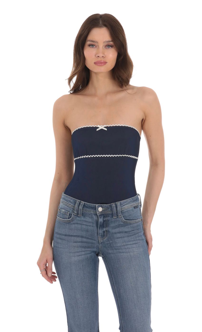 Picture Strapless White Accent Bodysuit in Navy. Source: https://media-img.lucyinthesky.com/data/Jan24/850xAUTO/5ab49ee6-751d-4e14-bd41-ee576c849b9a.jpg