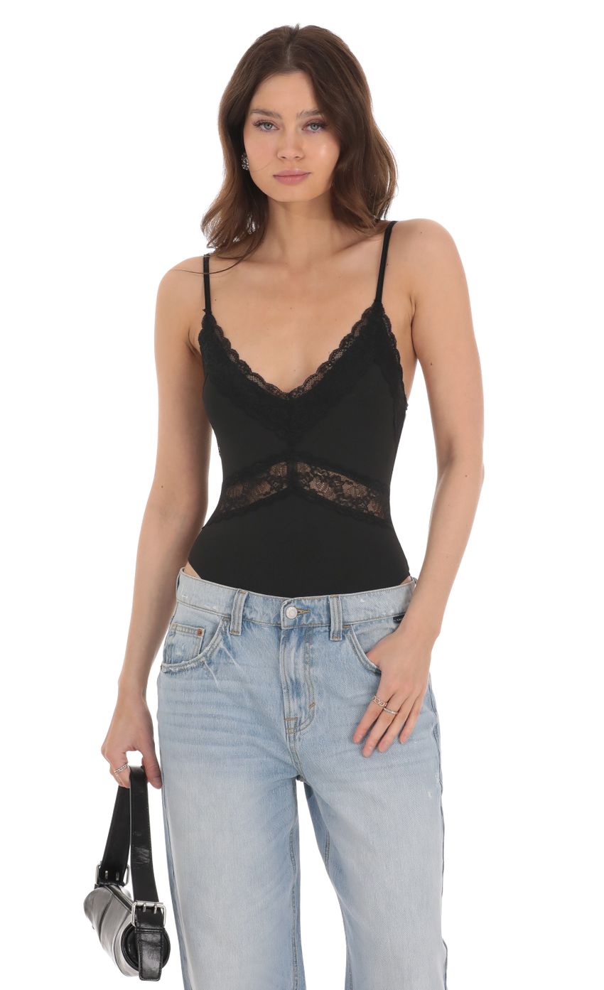 Picture Lace V-Neck Bodysuit in Black. Source: https://media-img.lucyinthesky.com/data/Jan24/850xAUTO/664ce0af-c769-4c55-a873-cd0f415afa24.jpg