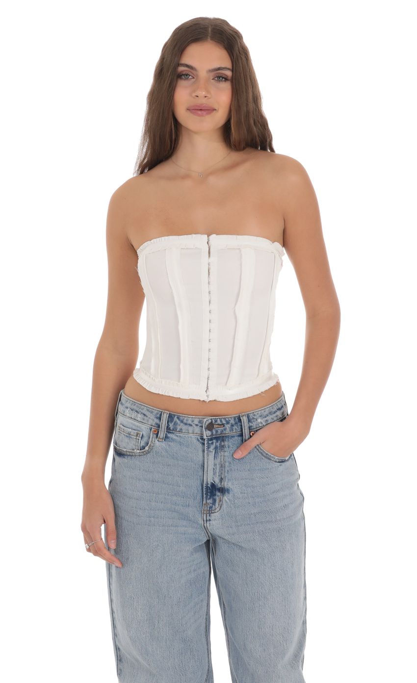 Picture Strapless Hook Corset Top in White. Source: https://media-img.lucyinthesky.com/data/Jan24/850xAUTO/66ad0a3c-1cb9-4ef8-a8cf-3244a9424694.jpg