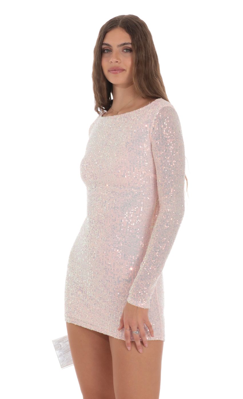 Picture Sequin High Neck Open Back Dress in Pink. Source: https://media-img.lucyinthesky.com/data/Jan24/850xAUTO/7a76471f-5efc-44a0-975f-a67c585bca33.jpg