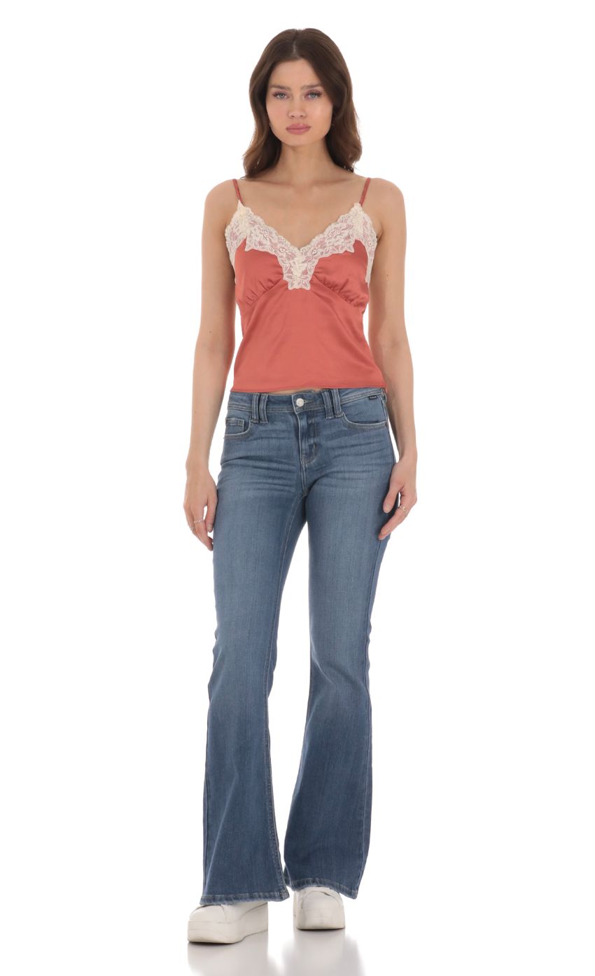 Picture Satin Lace V-Neck Top in Rust Coral. Source: https://media-img.lucyinthesky.com/data/Jan24/850xAUTO/7a93bec7-8b57-452f-8093-698f17c5c4a0.jpg