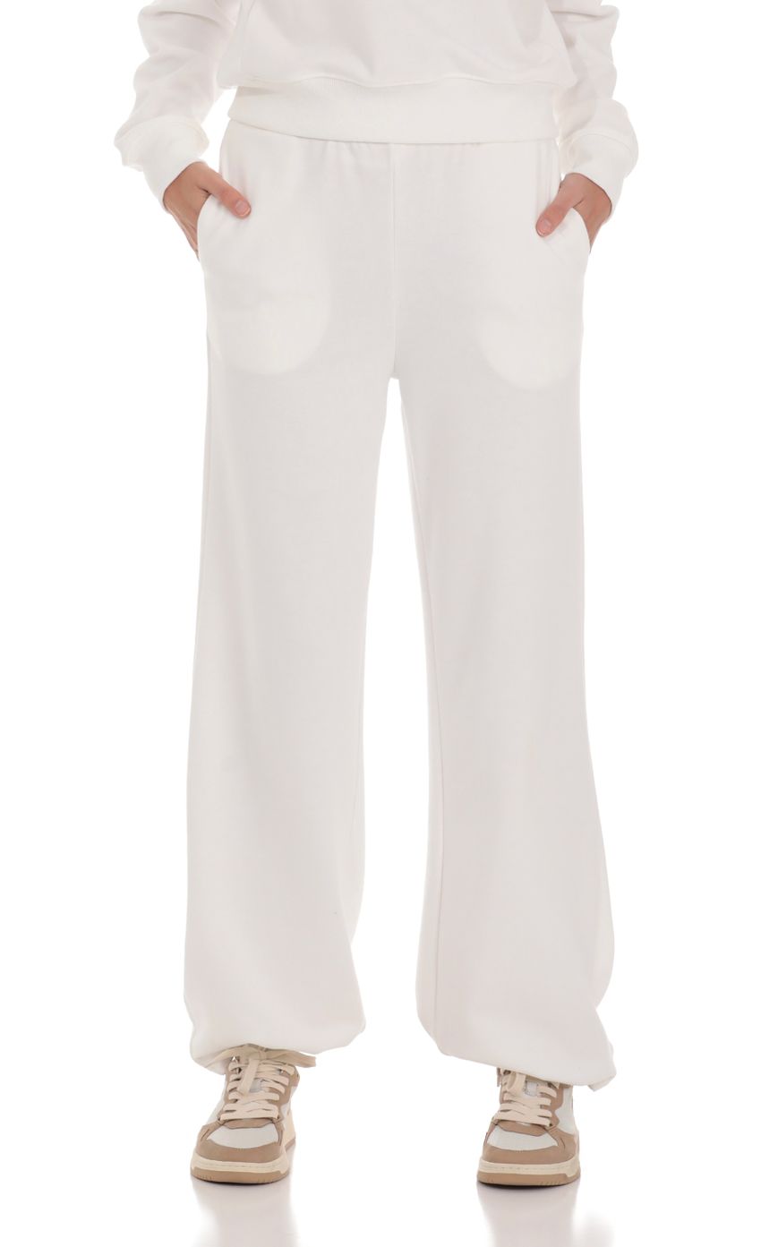Picture Heart Pocket Sweatpants in White. Source: https://media-img.lucyinthesky.com/data/Jan24/850xAUTO/7b0eaba5-6d07-4596-9749-ef98155abef8.jpg