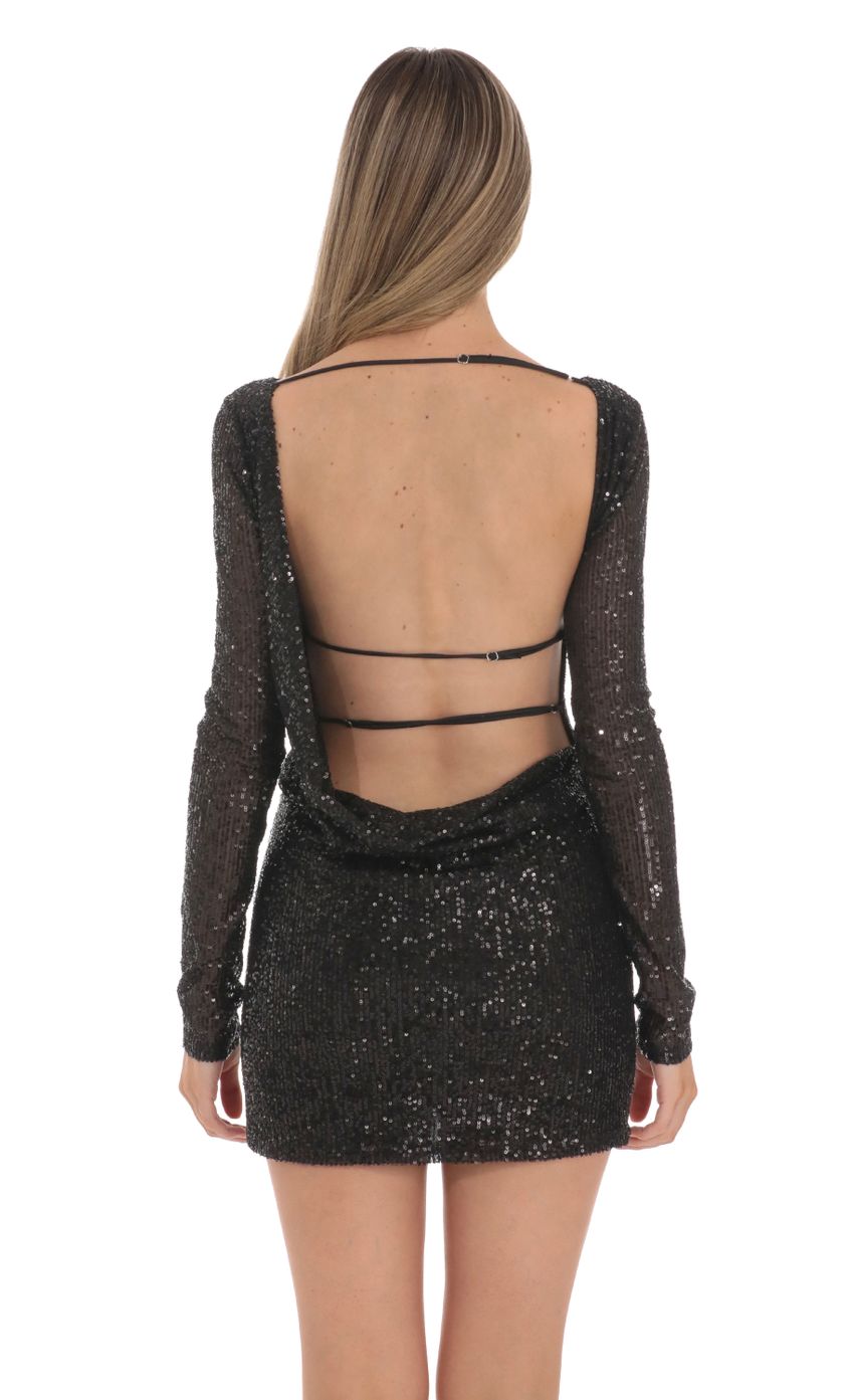 Picture Sequin High Neck Open Back Dress in Black. Source: https://media-img.lucyinthesky.com/data/Jan24/850xAUTO/8432ebfc-6bb6-4b94-9586-81c0eca7034a.jpg