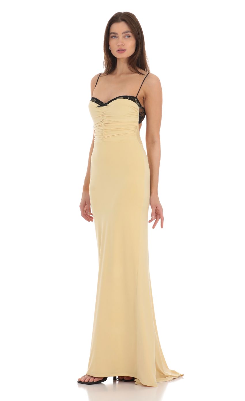 Picture Lace Bust Open Back Maxi Dress in Yellow. Source: https://media-img.lucyinthesky.com/data/Jan24/850xAUTO/89f143eb-8135-4ce9-872b-cea5011afd70.jpg