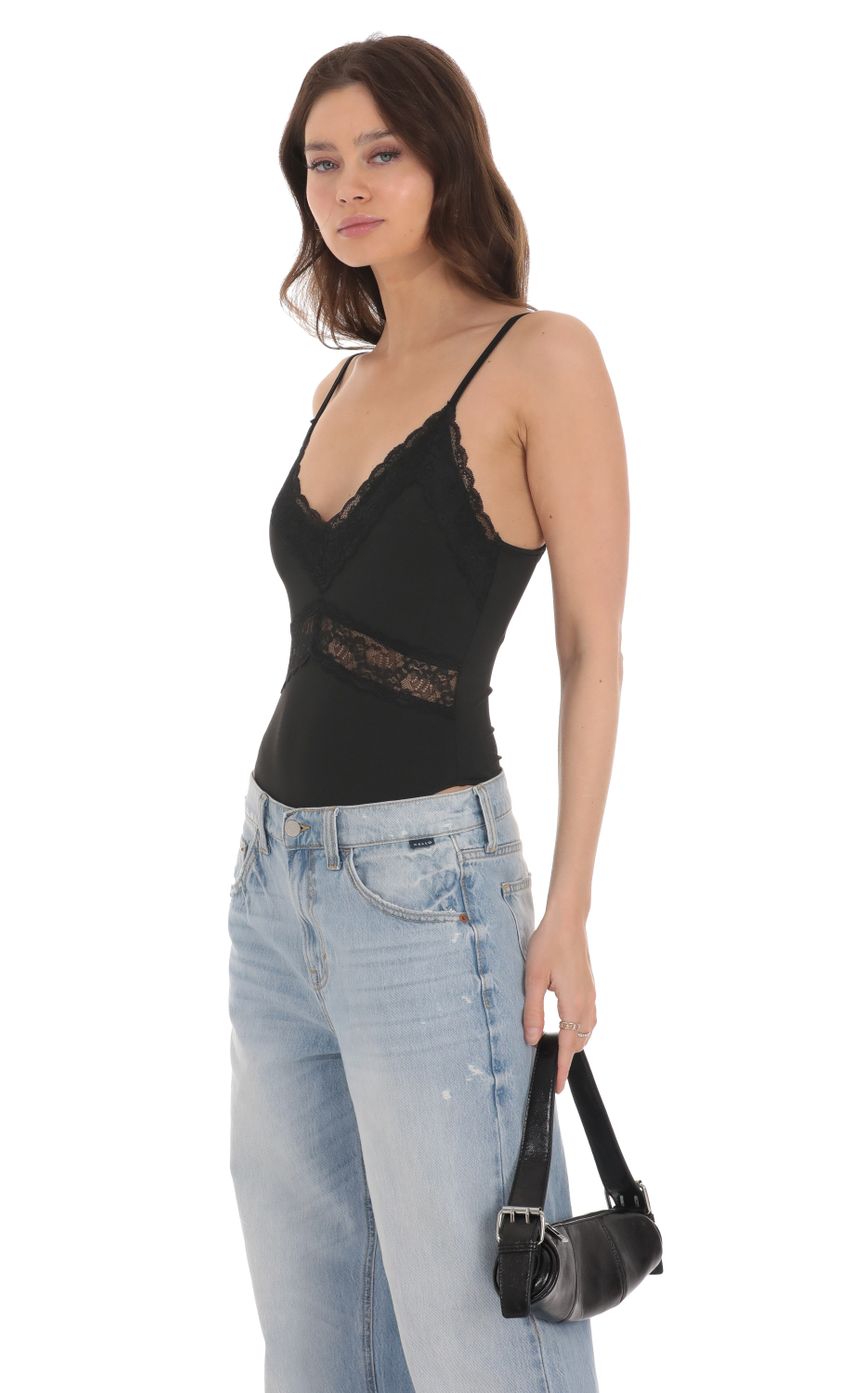 Picture Lace V-Neck Bodysuit in Black. Source: https://media-img.lucyinthesky.com/data/Jan24/850xAUTO/8f287b36-4d57-4dae-ac7c-fb671d56b439.jpg