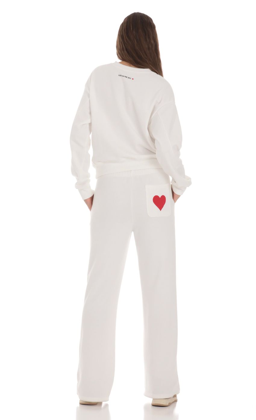 Picture Heart Pocket Sweatpants in White. Source: https://media-img.lucyinthesky.com/data/Jan24/850xAUTO/8f6782bb-3a53-45f8-8fbf-3d8297e5f9db.jpg