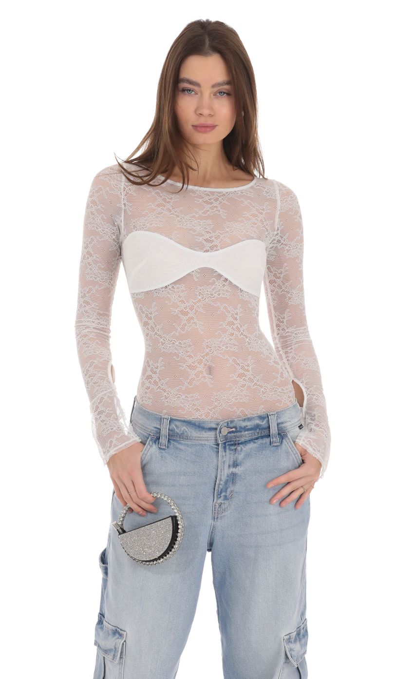 Picture Long Sleeve Lace Bodysuit in White. Source: https://media-img.lucyinthesky.com/data/Jan24/850xAUTO/91f64001-34a6-4277-b762-467cc6294628.jpg