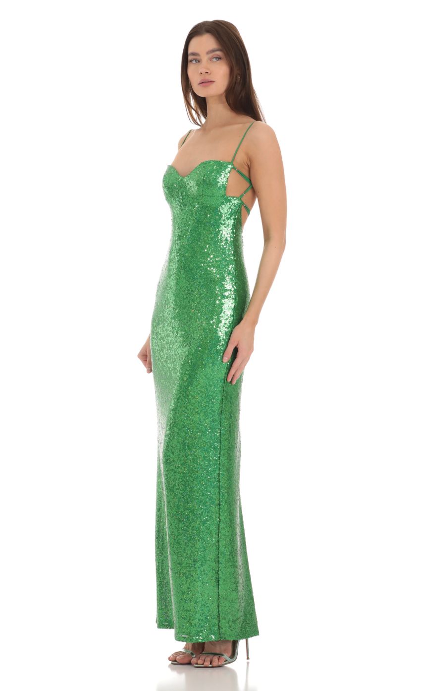 Picture Sequin Open Back Maxi Dress in Green. Source: https://media-img.lucyinthesky.com/data/Jan24/850xAUTO/94a0f35e-bdb2-44d2-be9b-6ccba65af6f8.jpg