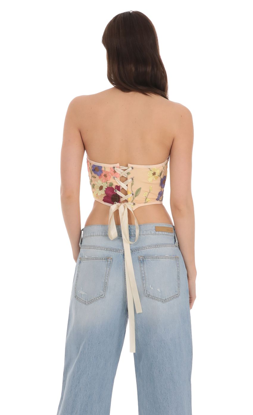 Picture Floral Embroidered Corset Top in Nude. Source: https://media-img.lucyinthesky.com/data/Jan24/850xAUTO/9c975b27-458c-4f5c-b01d-dfea50a60f5f.jpg