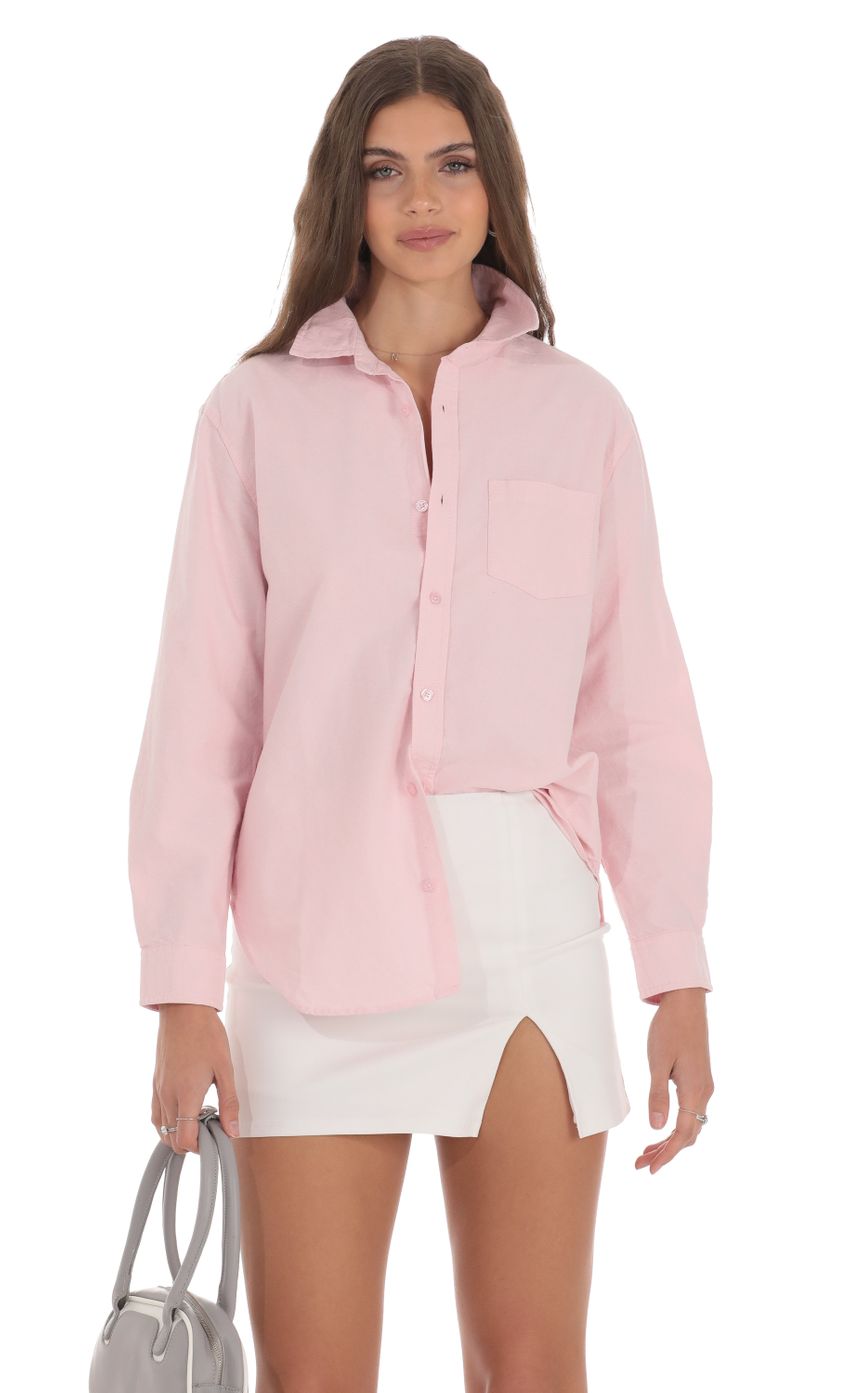 Picture Cotton Button Down Shirt in Pink. Source: https://media-img.lucyinthesky.com/data/Jan24/850xAUTO/a424354c-3ac9-4964-b4d5-a5206c86c5e7.jpg