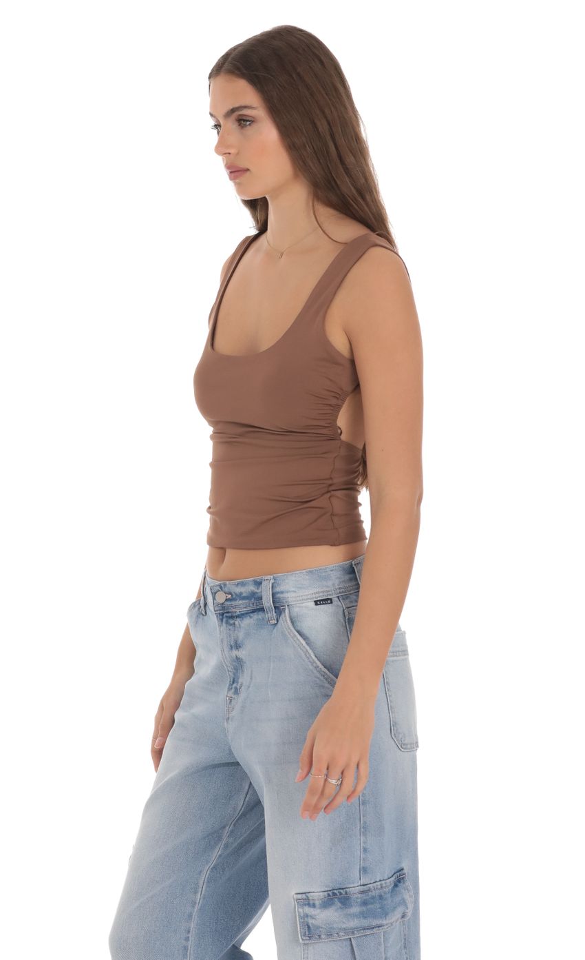 Picture Open Back Tank Top in Brown. Source: https://media-img.lucyinthesky.com/data/Jan24/850xAUTO/ad18e7ba-4994-4924-8278-03fc95fae5e2.jpg