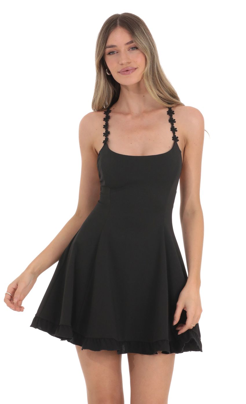 Picture Floral Strapped A-line Dress in Black. Source: https://media-img.lucyinthesky.com/data/Jan24/850xAUTO/b4dd4209-373d-4875-b31e-3c6326089fd4.jpg