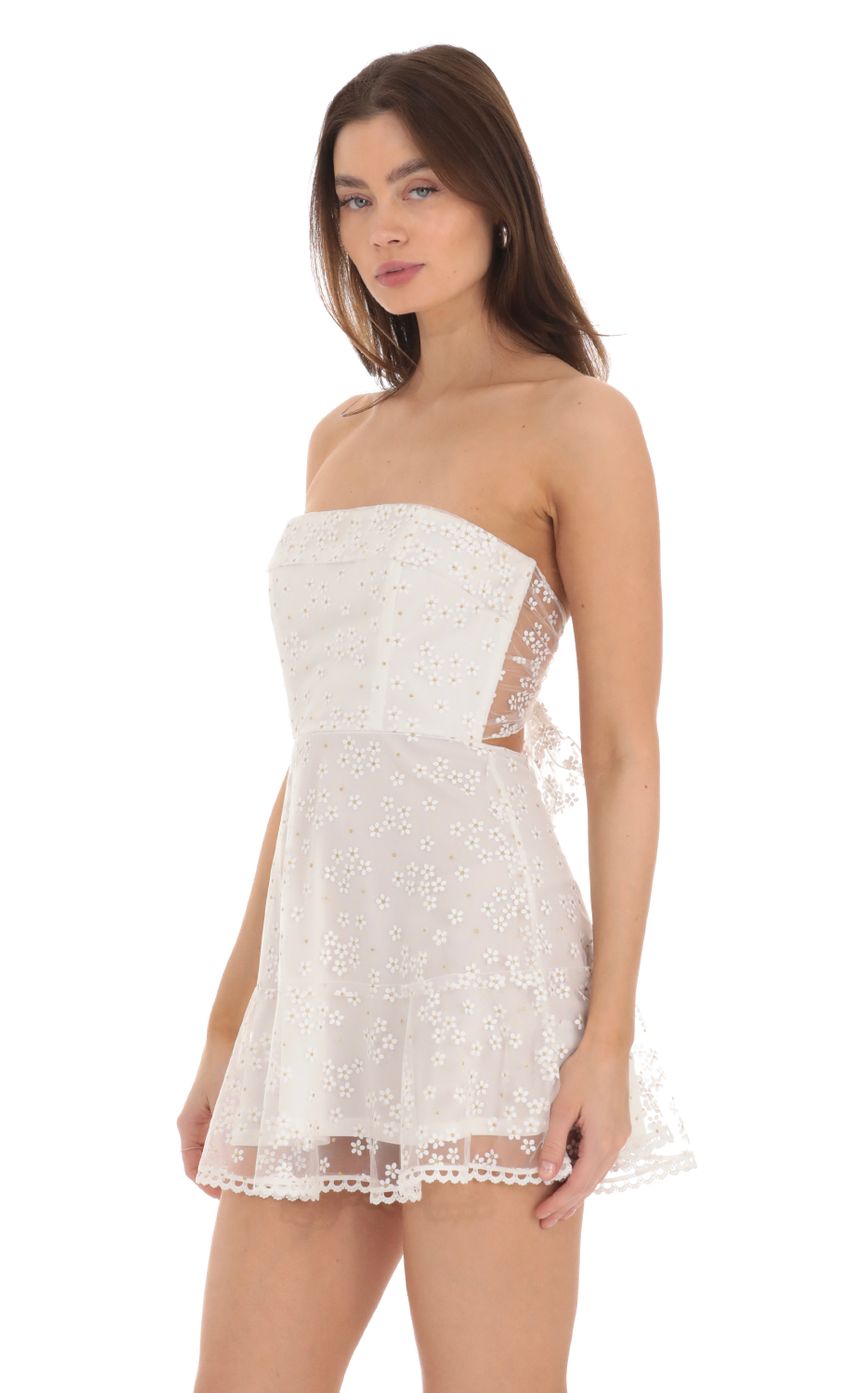 Picture Strapless Floral Shimmer Corset Dress in White. Source: https://media-img.lucyinthesky.com/data/Jan24/850xAUTO/b8c90605-10f8-43d2-b5f6-e7d1cc9b4bdf.jpg