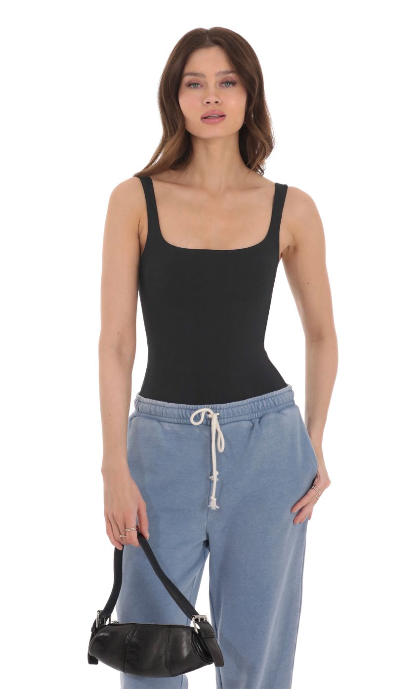 Picture Basic Tank Bodysuit in Black. Source: https://media-img.lucyinthesky.com/data/Jan24/850xAUTO/b9bcc046-a774-46e5-9c5d-e078730a0d39.jpg