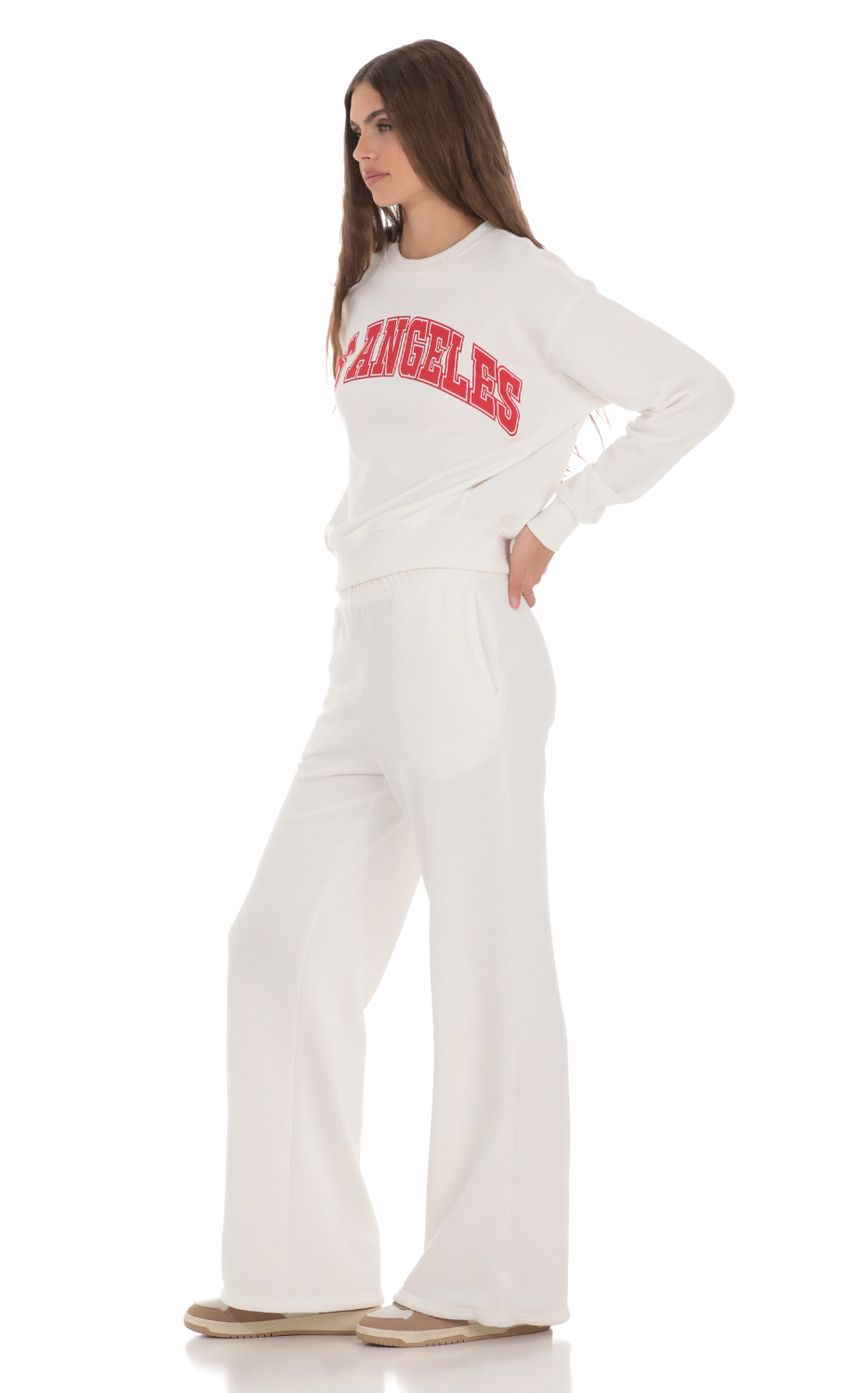 Picture Heart Pocket Sweatpants in White. Source: https://media-img.lucyinthesky.com/data/Jan24/850xAUTO/c029eb94-43af-4236-8609-e1648452e78b.jpg