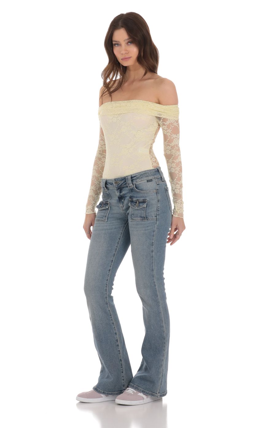Picture Button Pockets Flare Jeans in Denim. Source: https://media-img.lucyinthesky.com/data/Jan24/850xAUTO/c40df616-123f-4eda-9b14-85854fc84d41.jpg