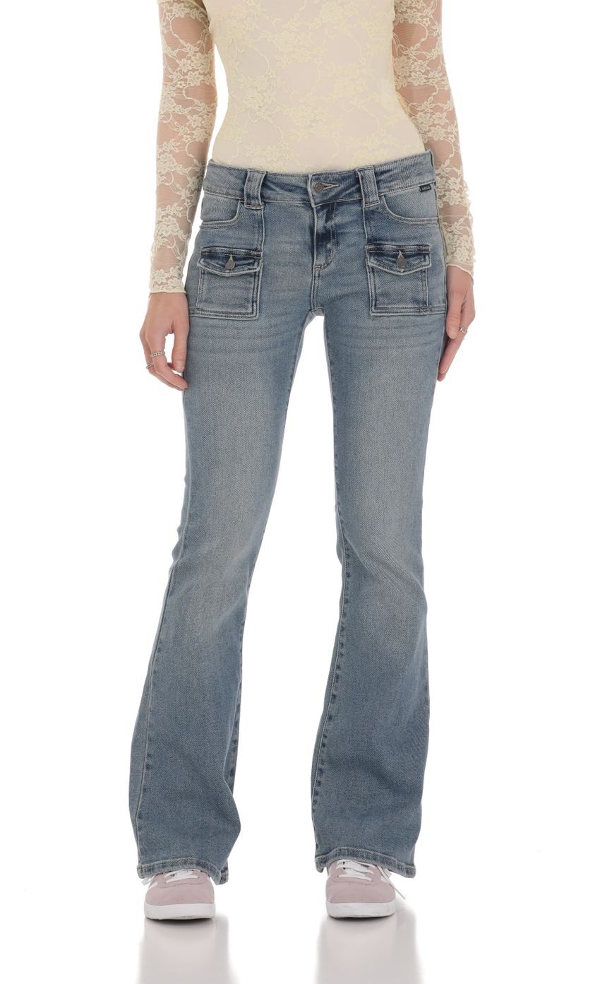 Picture Button Pockets Flare Jeans in Denim. Source: https://media-img.lucyinthesky.com/data/Jan24/850xAUTO/cc4c6871-a65e-41a1-8766-1e4675272b7a.jpg
