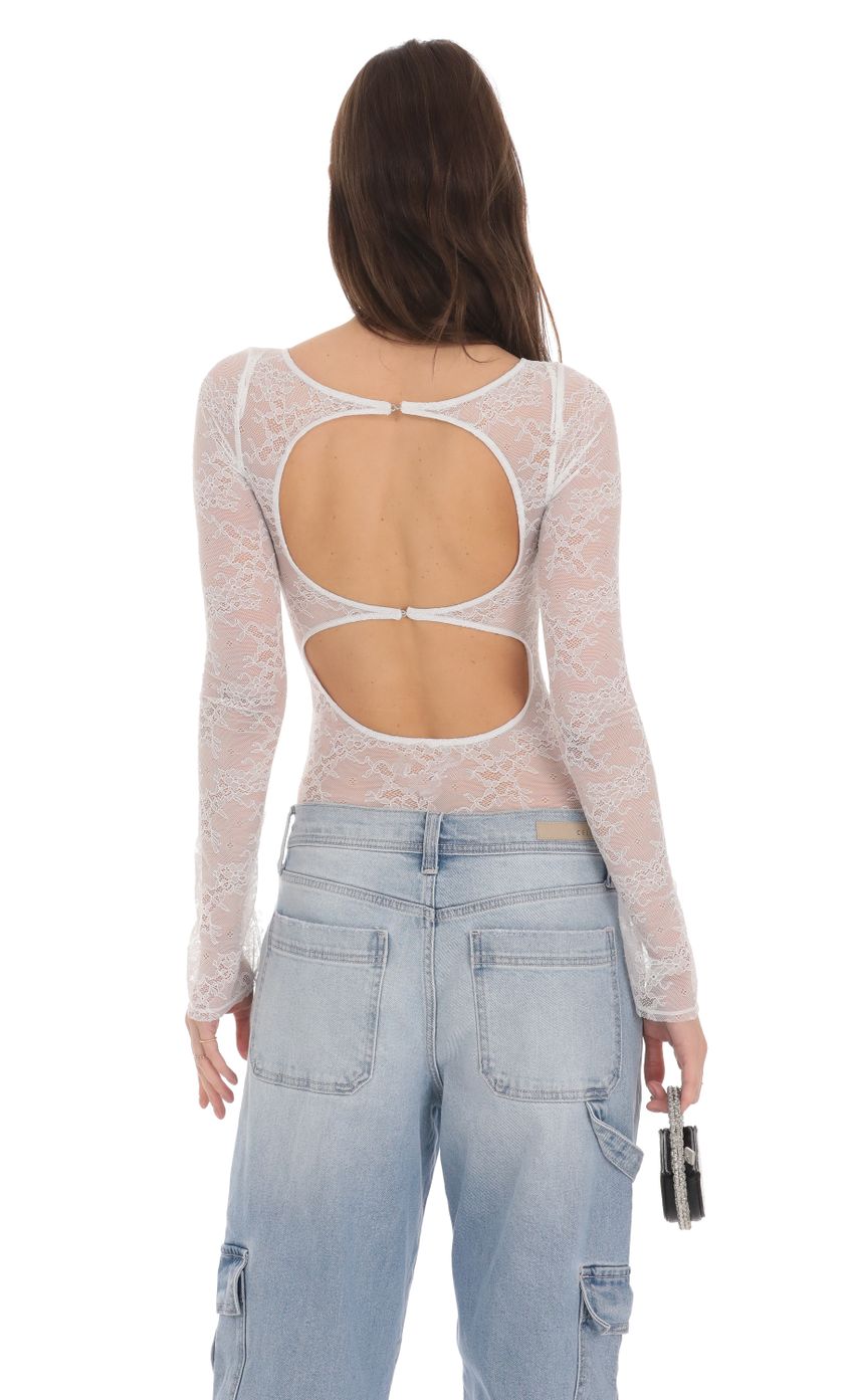 Picture Long Sleeve Lace Bodysuit in White. Source: https://media-img.lucyinthesky.com/data/Jan24/850xAUTO/cd6d685f-f1c2-4b88-8f0f-294e573ed041.jpg