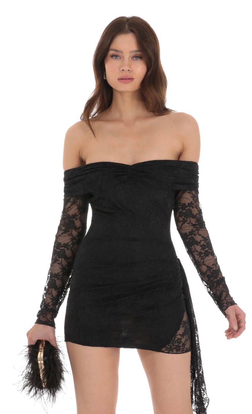 Picture Lace Off Shoulder Tassel Dress in Black. Source: https://media-img.lucyinthesky.com/data/Jan24/850xAUTO/d02caf03-53d4-4f3d-91ff-13cc6eec7faf.jpg