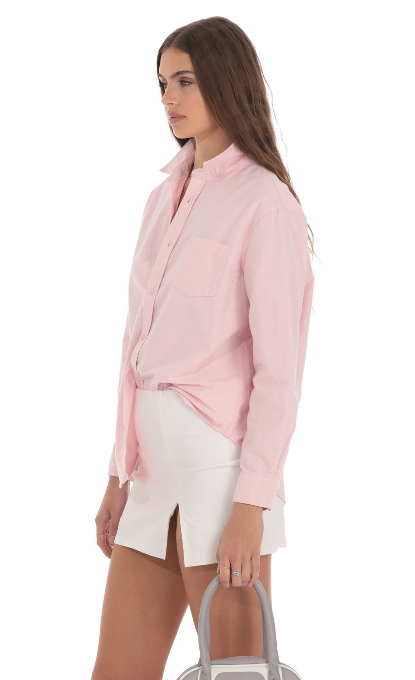 Picture Cotton Button Down Shirt in Pink. Source: https://media-img.lucyinthesky.com/data/Jan24/850xAUTO/d0502253-6299-41d0-9e8a-09d0ddf7e809.jpg