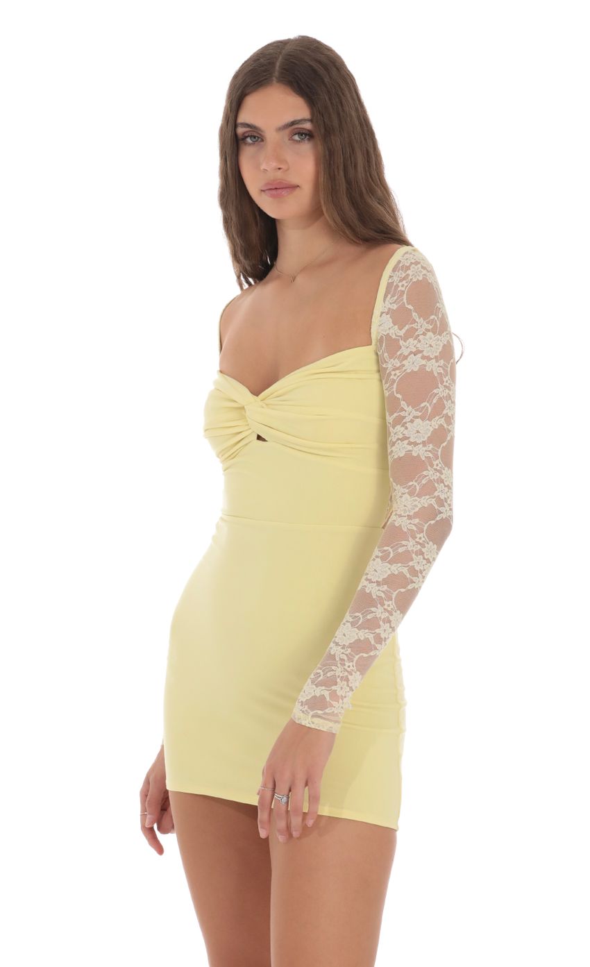 Picture Lace Long Sleeve Twist Bodycon Dress in Yellow. Source: https://media-img.lucyinthesky.com/data/Jan24/850xAUTO/d17f327d-cb25-41c7-9391-66b53b034ec0.jpg