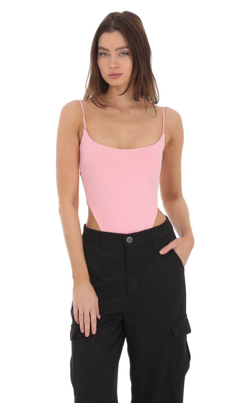 Picture Open Back Strappy Bodysuit in Pink. Source: https://media-img.lucyinthesky.com/data/Jan24/850xAUTO/d387daa7-debf-4d3e-85a4-d252738a51dd.jpg