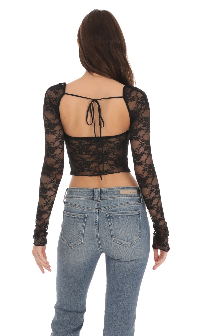Picture Elianna Lace Top in Black. Source: https://media-img.lucyinthesky.com/data/Jan24/850xAUTO/d808de4d-bc74-4ef4-9329-174ef8a2e94b.jpg