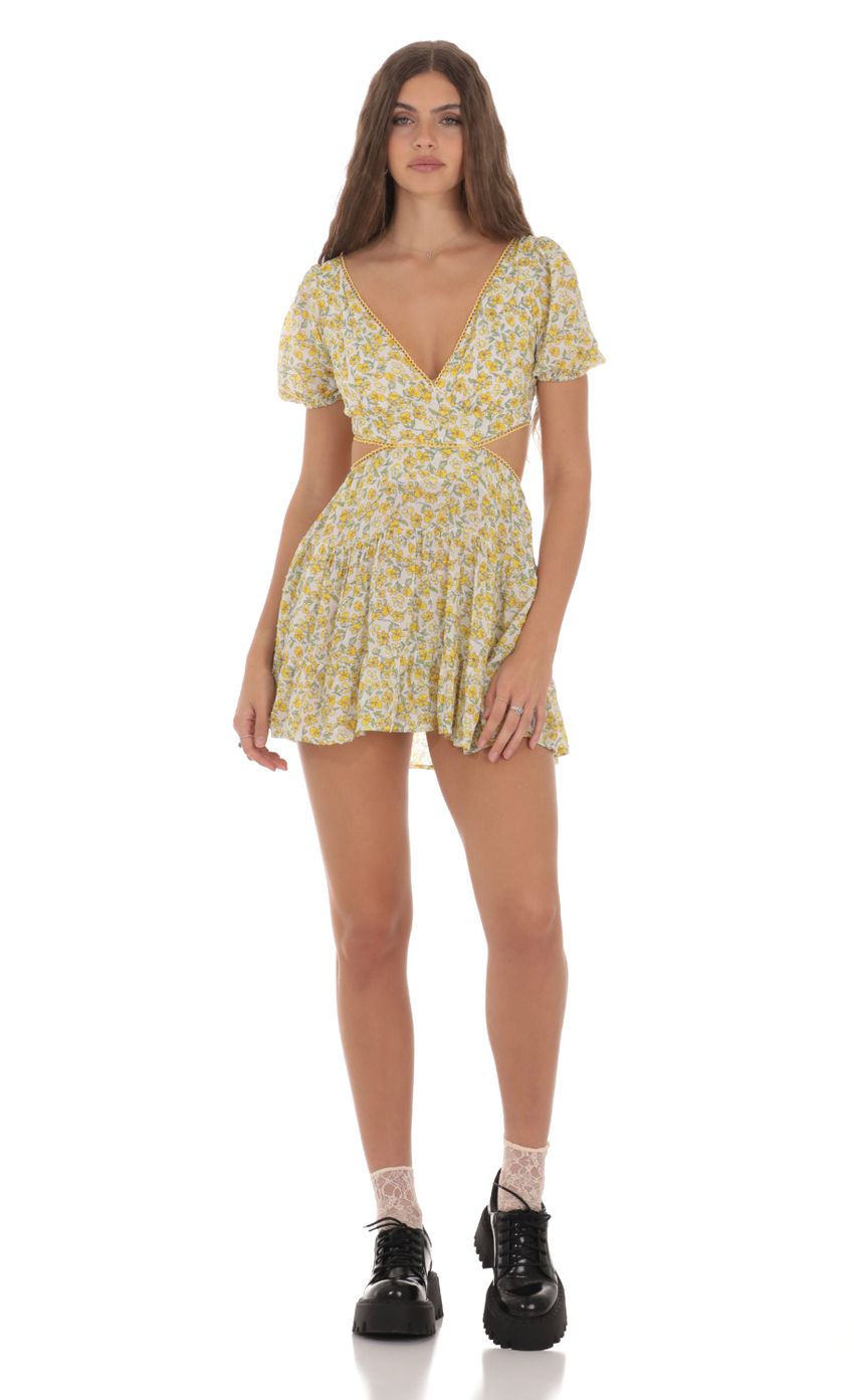 Picture Yellow Floral Cutout Dress in White. Source: https://media-img.lucyinthesky.com/data/Jan24/850xAUTO/d847766d-b6a1-4c84-a785-a7926414348b.jpg