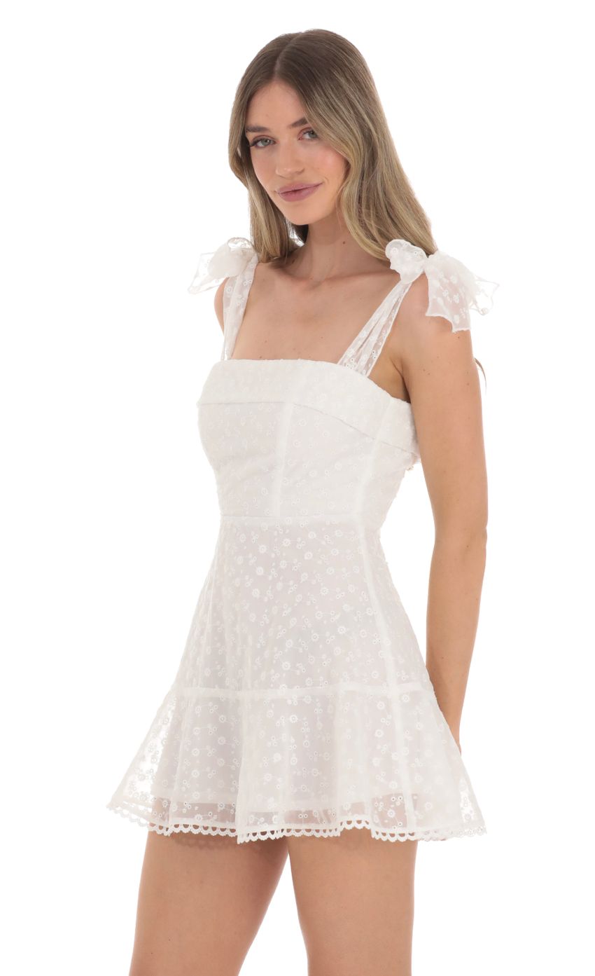 Picture Floral Embroidered A-line Dress in White. Source: https://media-img.lucyinthesky.com/data/Jan24/850xAUTO/dc00b564-865e-46d0-acbe-cb493b51d3d7.jpg