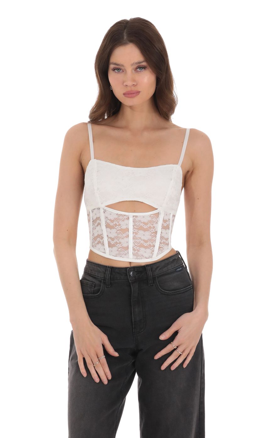 Picture Lace Satin Cutout Top in White. Source: https://media-img.lucyinthesky.com/data/Jan24/850xAUTO/e3495a8f-2263-4089-b40f-798304b17642.jpg