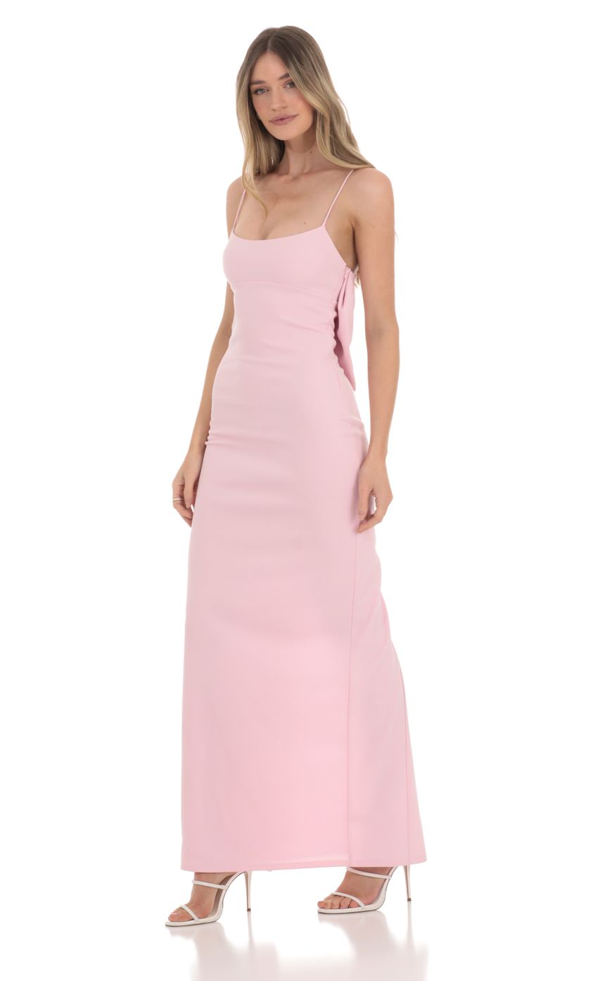 Picture Back Bow Maxi Dress in Pink. Source: https://media-img.lucyinthesky.com/data/Jan24/850xAUTO/e3c033e8-67c4-4c31-bfe7-4e265636f900.jpg